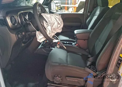 2023 Jeep Wrangler Sahara z USA, uszkodzony, nr VIN 1C4HJXEG0PW618005